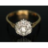 A seven stone diamond cluster ring, total approx. diamond wt. 0.21 carats, colour K/L, clarity VS1/