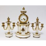 A French late 19th century marble and ormolu clock garniture, height 40cm.