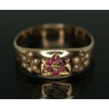 A Victorian hallmarked 15ct gold pearl and ruby ring, gross wt. 2g, size O. Condition - evidence