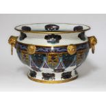 A Chinese cloisonne jardiniere, flared rim, blue interior, the exterior decorated with gilt mask