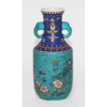 A Chinese porcelain vase, 20th century, eight character mark to base, height 17cm. Condition -