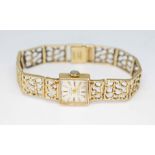 A ladies halmarked 9ct gold Swiss Empress 21 jewel wristwatch with hallmarked 9ct gold strap,
