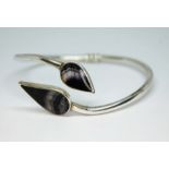 A modern Blue John fluorite set twist action silver bangle by Anthony Stephen Darwent, Sheffield