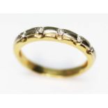 An 18ct two colour gold five stone diamond ring, total approx. diamond wt. 0.15 carats, marked '