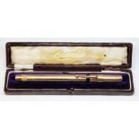 A hallmarked 9ct gold Delarue fountain pen, sponsor's mark 'DLR', London 1922, gross wt. 21.8g, with