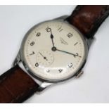 An oversized Longines, circa 1947, ref. 23490, cal. 12.68Z (unmarked), stainless steel case, diam.