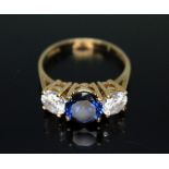 A hallmarked 14ct gold blue and white CZ ring, gross wt. 4.7g, size R.