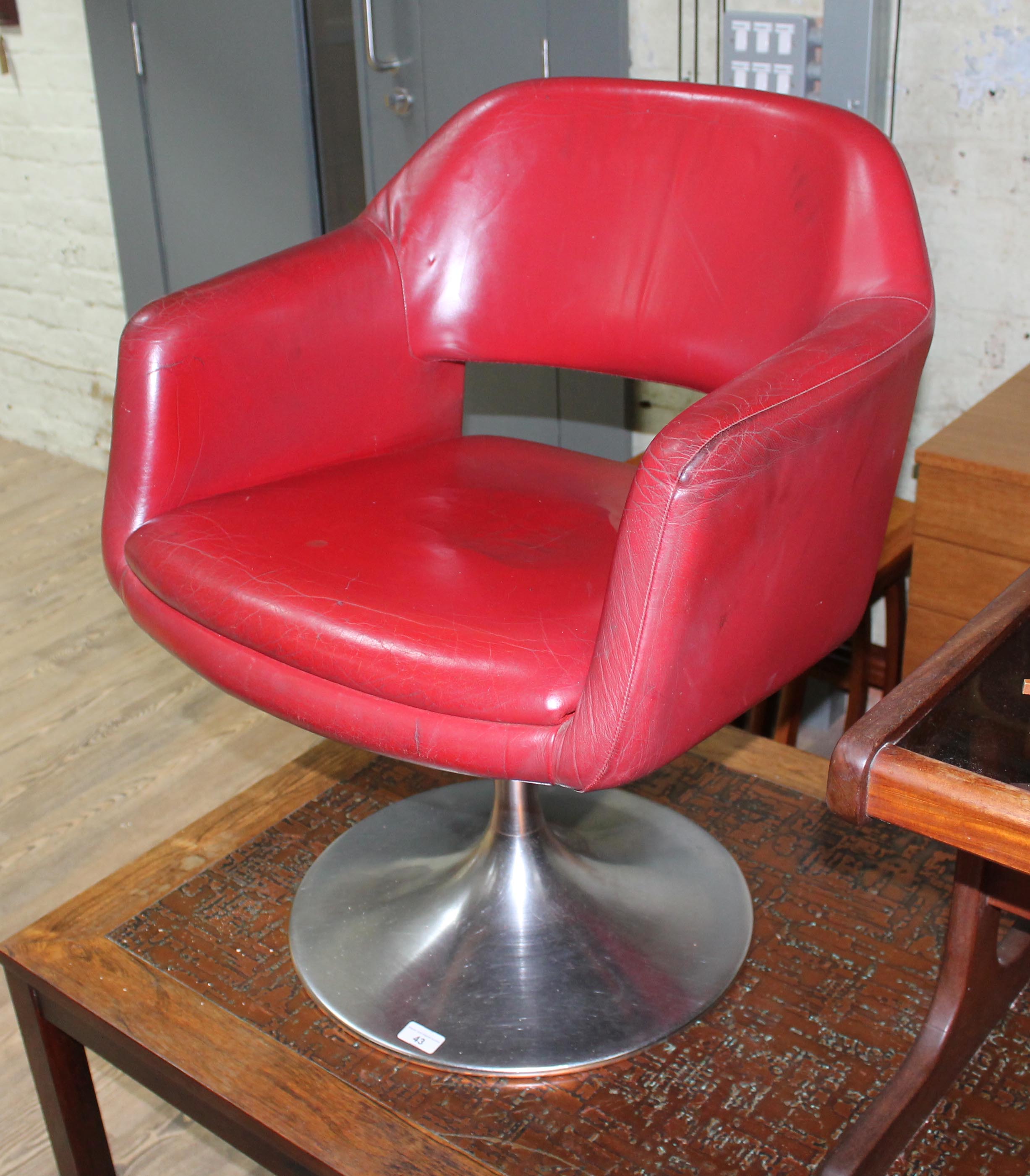 A retor tulip base chair.