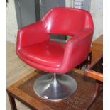 A retor tulip base chair.