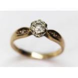 A hallmarked 9ct gold diamond solitaire ring, the central stone weighing approx. 0.25ct, gross wt.