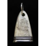 An Irish 18th century silver mounted marine ivory scrimshaw, one side decorated with a galleon and