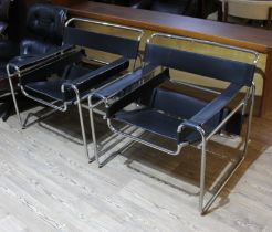 A pair Wasilly style tubular metal and leather chairs after a design by Marcel Breuer.