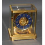 A Jaeger LeCoultre Atmos clock, blue faux lapis ring dial, height 23.5cm.