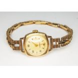 A hallmarked 9ct gold Vertex wristwatch with hallmarked 9ct gold strap, 15 jewel manual wind