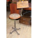 A Victorian Carter's 'Literary Machine' walnut and brass adjustable reading table/stand on cast