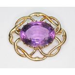 A hallmarked 9ct gold amethyst brooch, length 34mm, gross wt. 9.1g.