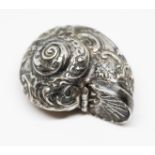 A novelty cast silver snuff box modelled as a shell, sponsor's mark 'BAC', London 1976, length 45mm,