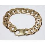 A 9ct gold curb link bracelet, international convention marks, length 21cm, wt. 58.1g.