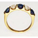 A diamond and sapphire baguette ring, three round cut sapphires weighing approx. 1ct in total,