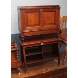 A late Victorian walnut bureau bookcase in the manner of James Shoolbred, the brass lock being