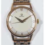 A 9ct gold Omega watch, circa 1956, cal. 284, diameter 32mm, signed textured two tone dial, sword