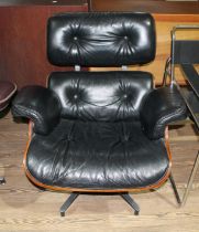 A black leather 670 lounge chair after Charles & Ray Eames.