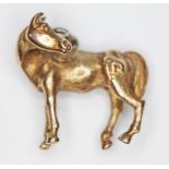 A hallmarked 9ct gold equestrian themed charm modelled as a horse, length 24mm, wt. 8g.