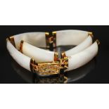 A Chinese mother of pearl bracelet, marked '14K' (one link join damaged), gross wt. 21.5g.