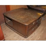 An Ercol dark elm 'Pandora' coffee table, width 80cm.