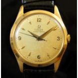 An 18ct gold Omega chronomtre wristwatch, circa 1950s, diameter 35mm, signed gold tone dial sword