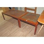 A pair of Danish rosewood coffee tables with textured copper tops, CITES no. 619460/01.