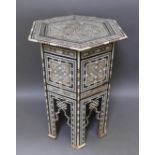 A Moorish bone and mother of pearl inlaid occasional table, height 78cm.