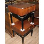 A pair of G-Plan teak and black bedside cabinets.