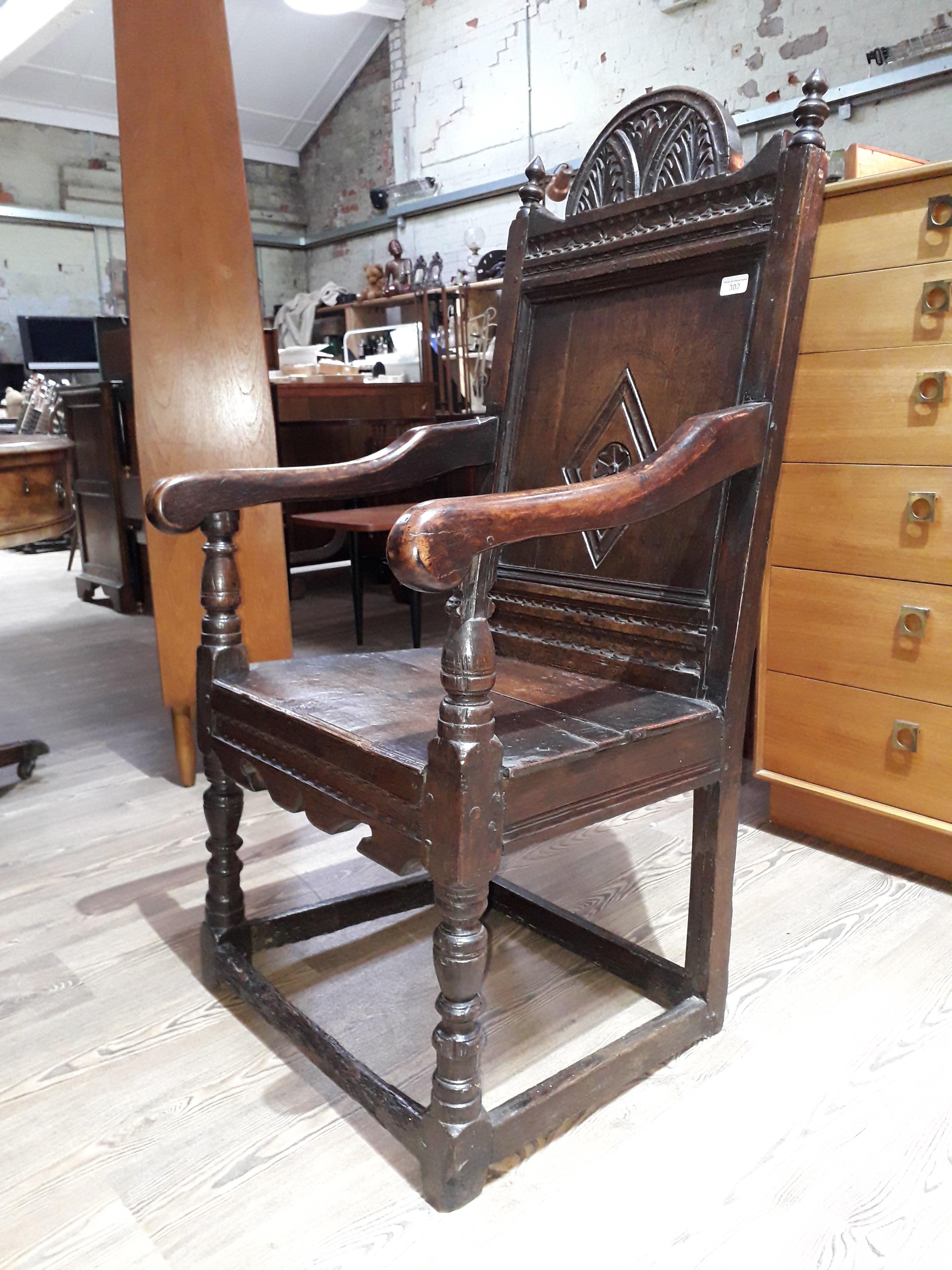 A 17th century joined oak armchair. - Image 2 of 11