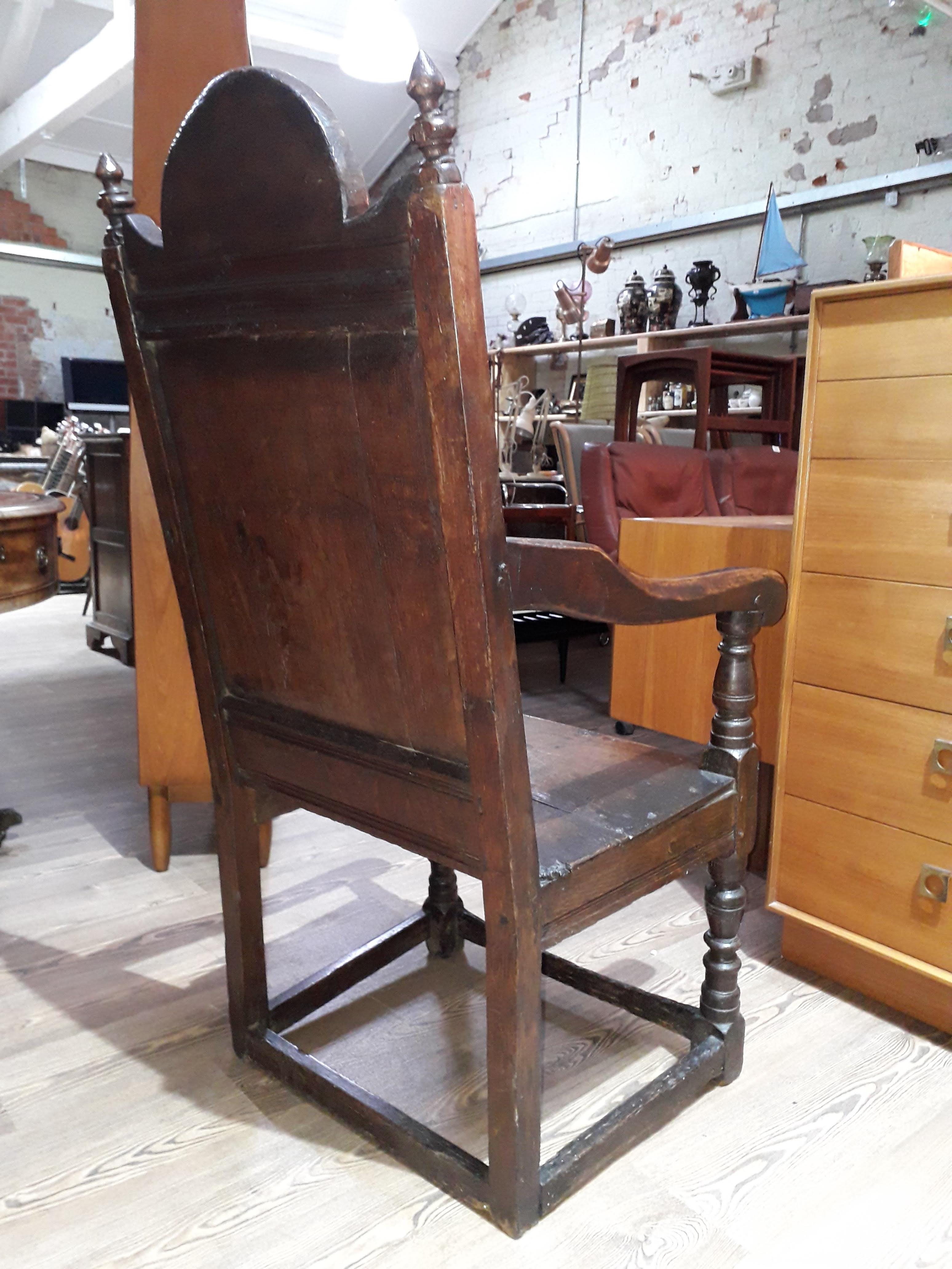 A 17th century joined oak armchair. - Image 4 of 11