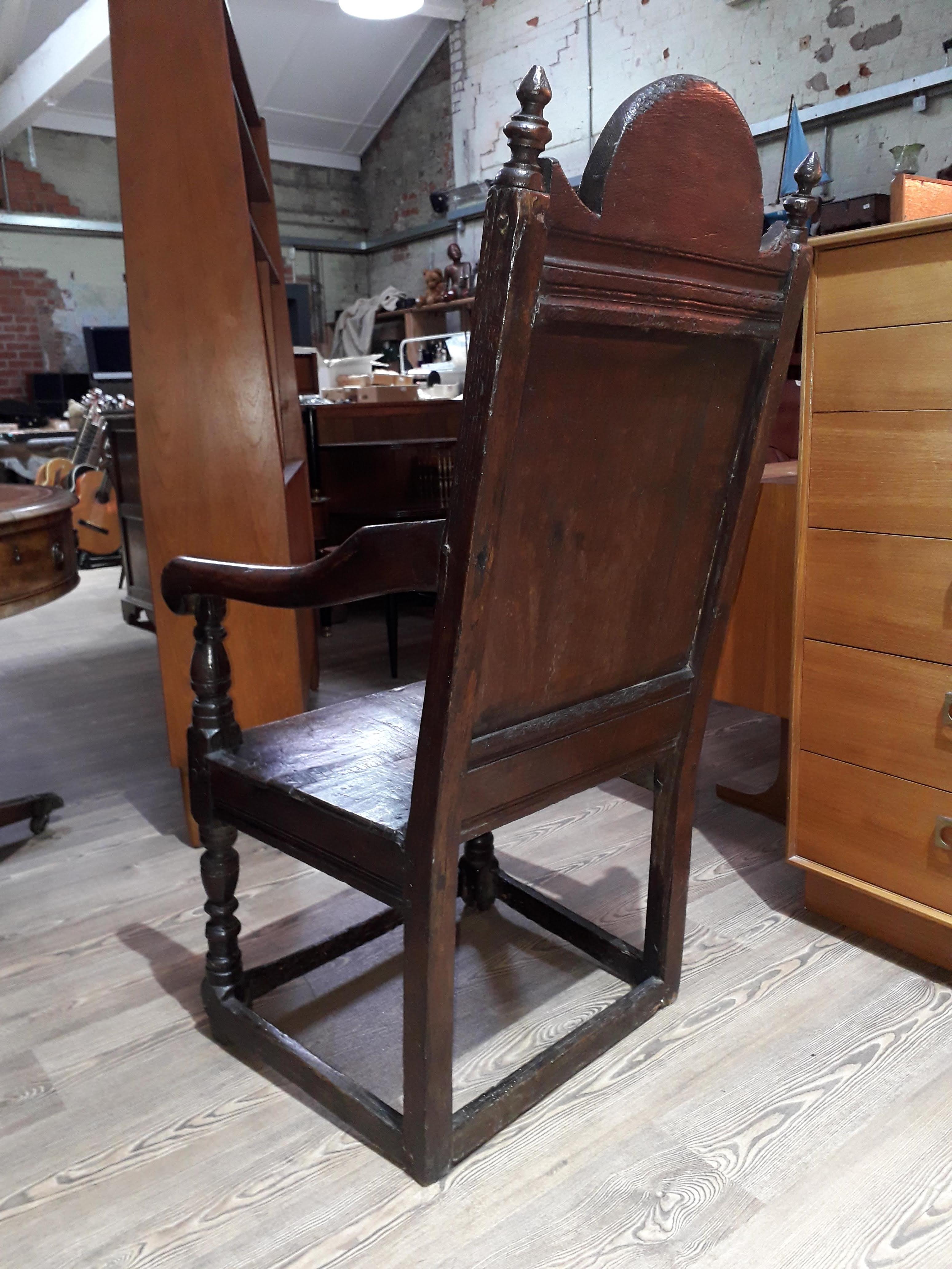 A 17th century joined oak armchair. - Image 3 of 11