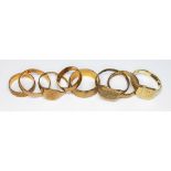 Eight hallmarked 9ct gold wedding bands and signet rings, gross wt. 22g, sizes M to V.