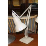 A Herbert Terry and Sons cream Angle-poise lamp with bakelite crabtree switch.