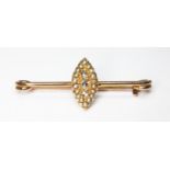 An antique diamond and pearl cluster brooch, the navette shaped cluster measuring approx. 14mm x 7.