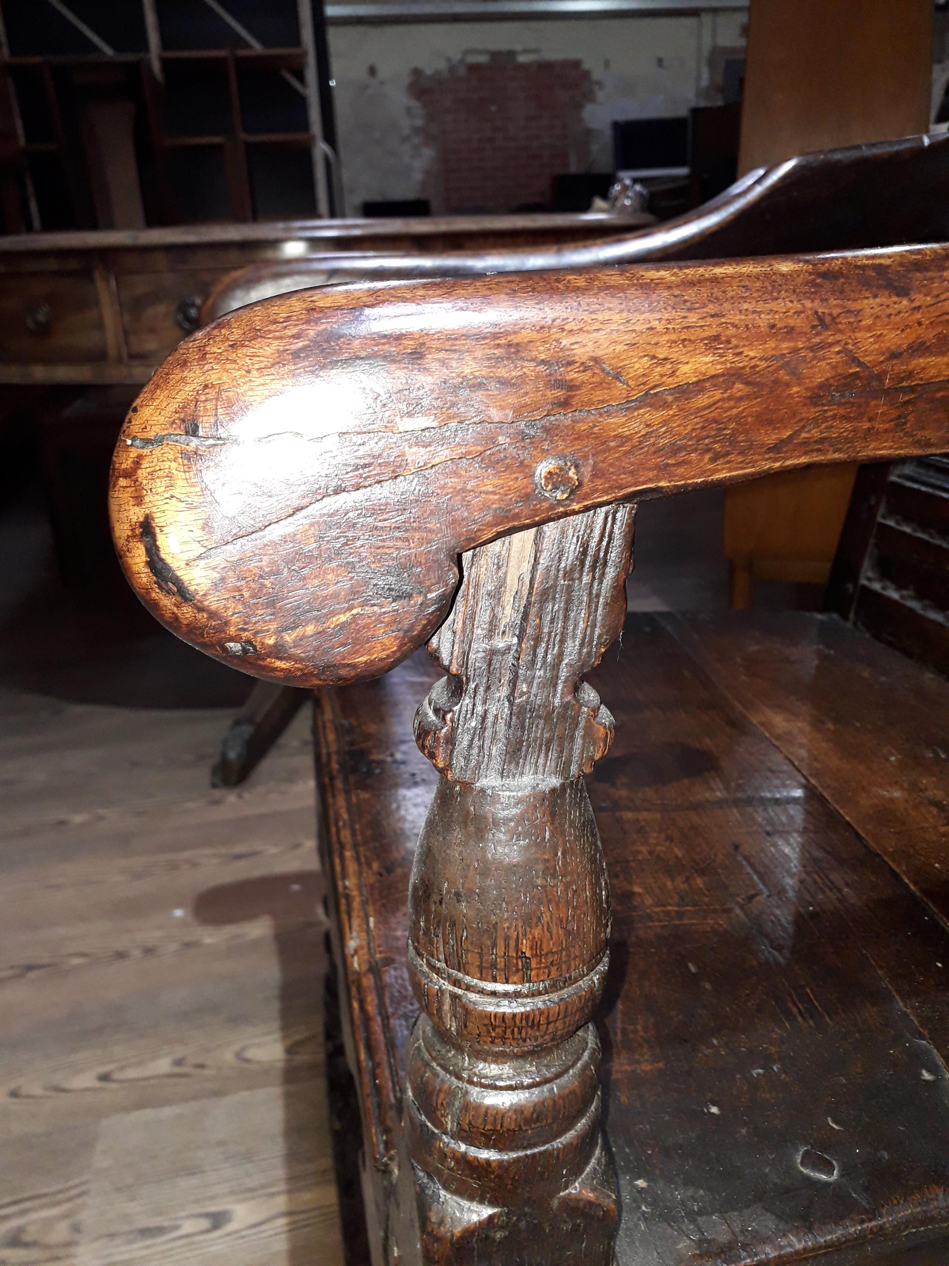 A 17th century joined oak armchair. - Image 8 of 11