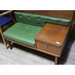 A retro Chipp teak telephone seat.