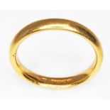 A hallmarked 22ct gold wedding band, wt. 4.9g, size N.