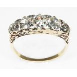 An antique five stone diamond ring, the old European cut stones weighing approx. 0.22, 0.43, 0.71,