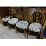 A set of four Ercol Golden Dawn chairs.
