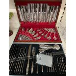 A 44 piece canteen of cutlery by Oneida, and a boxed 30 piece stainless steel cutlery set by Stellar