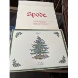 A boxed set of Spode Christmas mats.