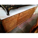 A French style inlaid and gilt mounted sideboard with marble top, length 191cm.