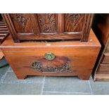 A Chinese carved camphorwood chest, length 101cm.