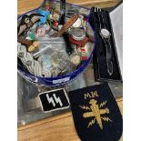 A box of collectables to include watches and militry badges etc.