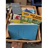 A box of car owners hand books dating back to 1950s and onwards